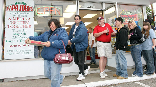 People leave Papa John's in Cleveland with pizza for 23 cents