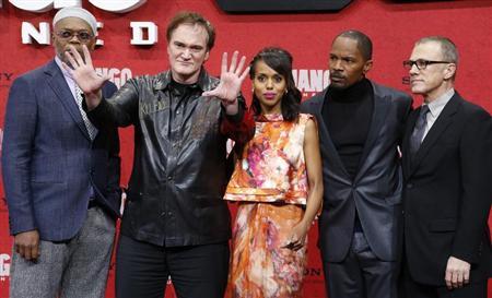 Cast members Jackson Tarantino Washington Foxx and Waltz pose on red carpet for German premiere in Berlin