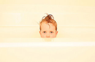 kid in bathtub