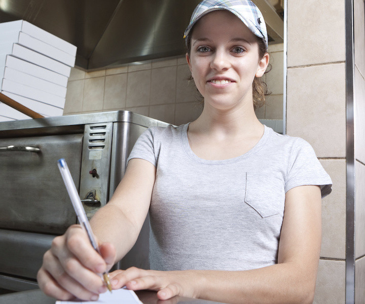 Take out order waitress in a fast food restaurant