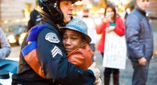 cop-boy-hug youthculture