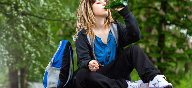 Girl playing hookey and drinking alcohol