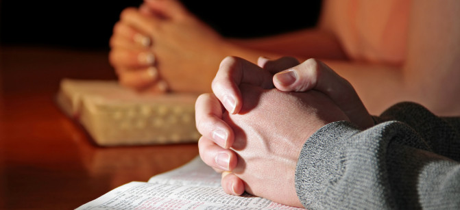 Praying Hands Bibles Couple