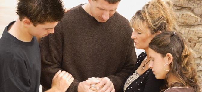 Family Praying parents mom dad