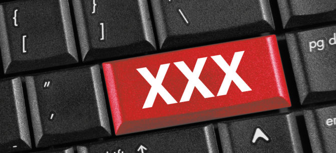 18+ online concept, symbol on red button keyboard