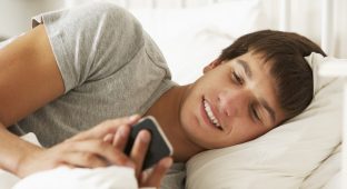Teen sleep Boy In Bed  Texting