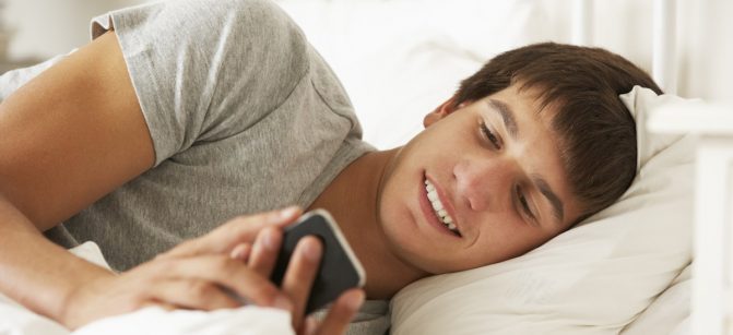 Teen sleep Boy In Bed  Texting