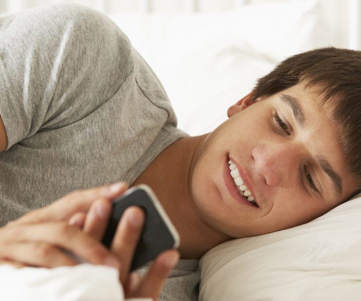 Teen sleep Boy In Bed  Texting