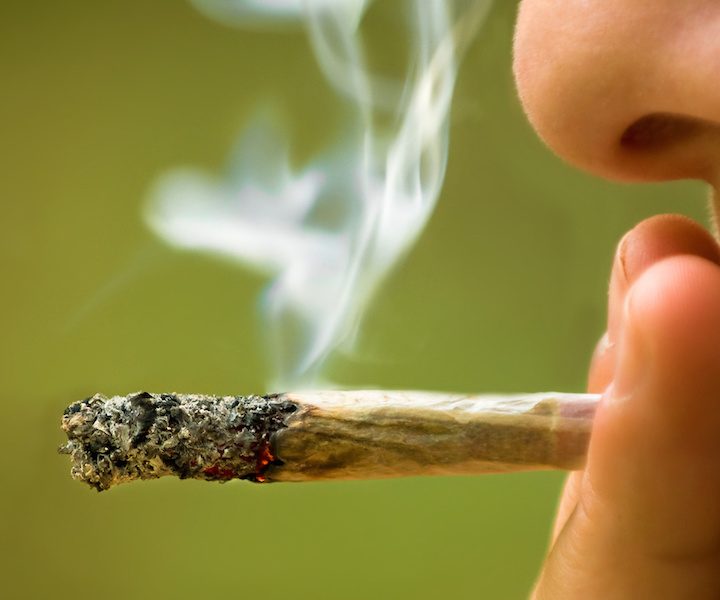 girl smoking marijuana close up