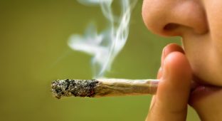 girl smoking marijuana close up