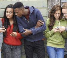 Group Of Teenagers phones cell
