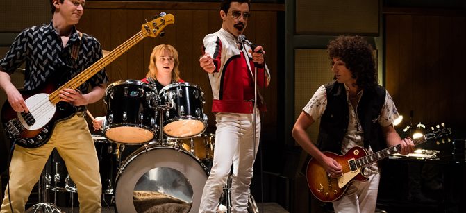 DF-25953 – L-R: Joe Mazzello (John Deacon), Ben Hardy (Roger Taylor), Rami Malek (Freddie Mercury), and Gwilym Lee (Brian May) star in Twentieth Century Fox’s BOHEMIAN RHAPSODY. Photo Credit: Alex Bailey.