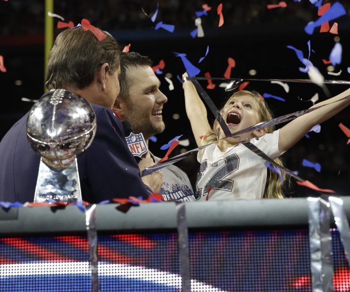 New England Patriots' Tom Brady holds his daughter Vivian, after the NFL Super Bowl 53 football game against the Los Angeles Rams, Sunday, Feb. 3, 2019, in Atlanta. The Patriots won 13-3. (AP Photo/Carolyn Kaster) ORG XMIT: NFL