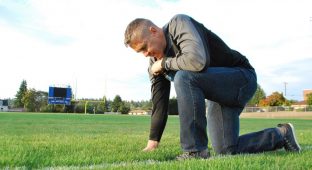 Praying coach football