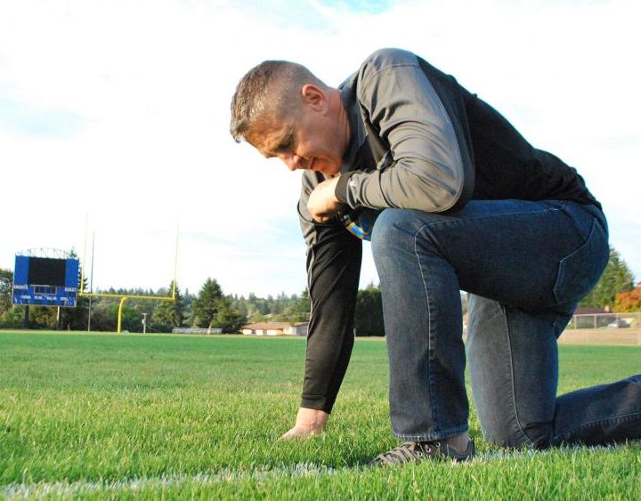 Praying coach football