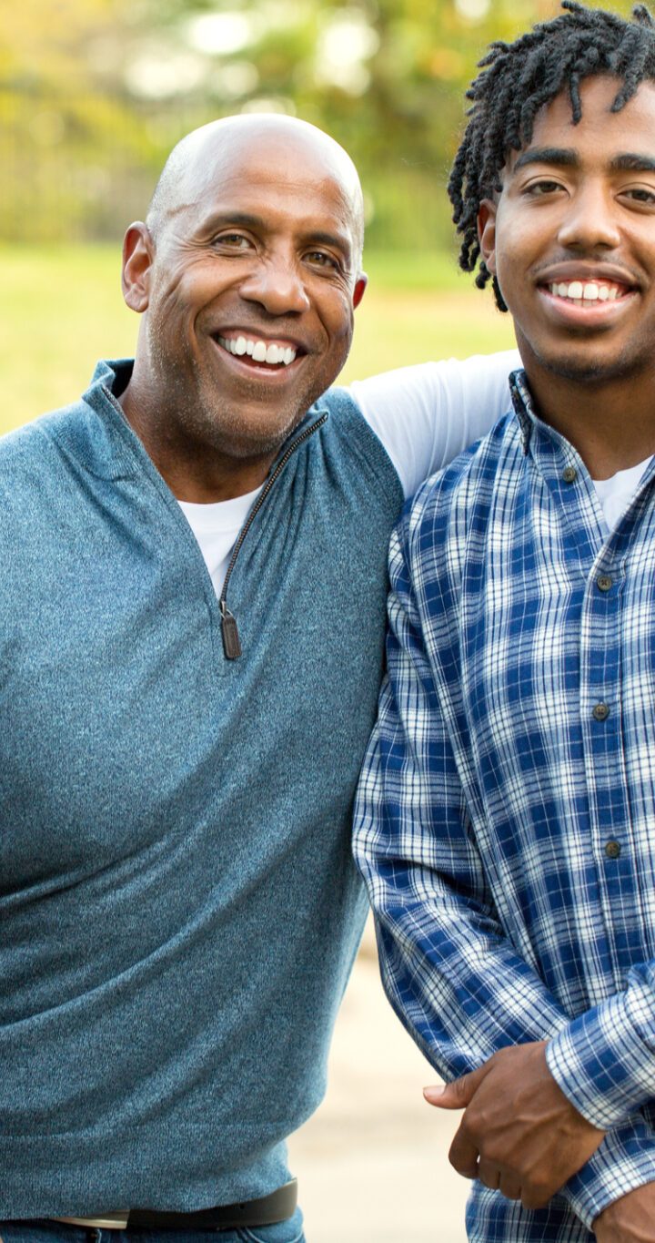 Portrait of an African American father and his son.